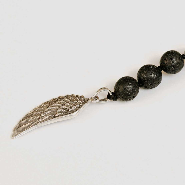 Black Lava Tie Mala with Silver Wing Pendant - Handmade with 108 Mala Beads by Manipura