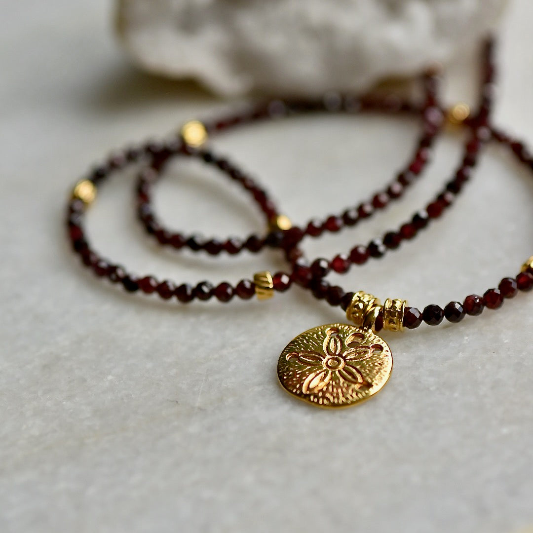 Natural Passion gemstone necklace with Garnet and a flower pendant