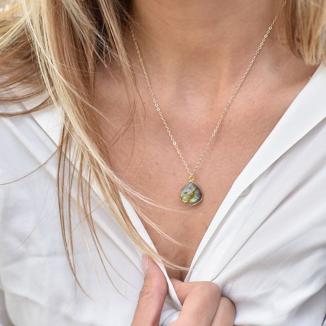 Lady wearing a Labradorite Protection Necklace by Manipura 