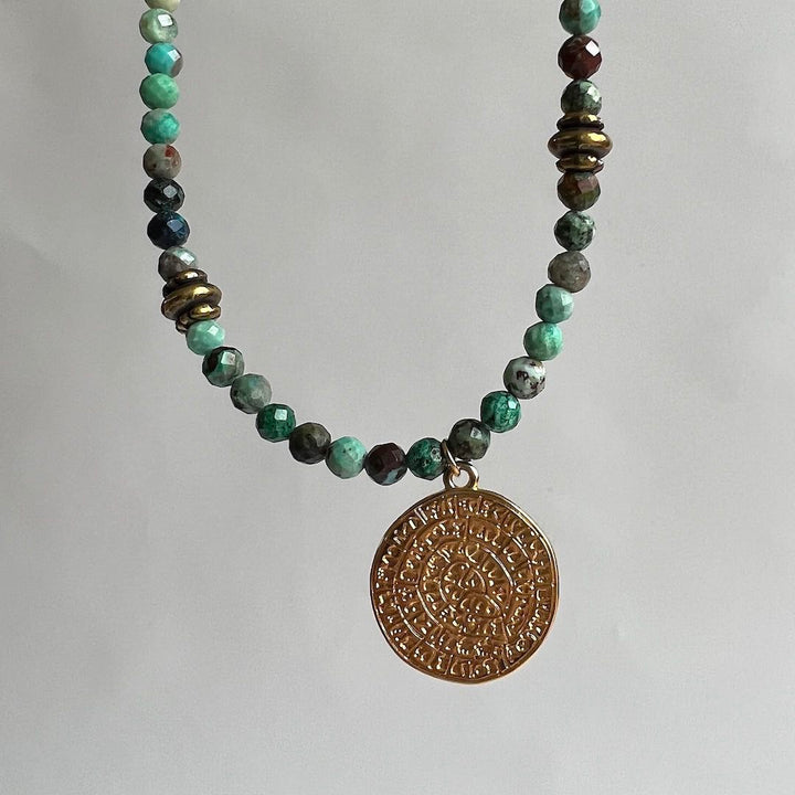 Details of Natural Healer Gemstone necklace with Chrysocolla and golden sun pendant Manipura